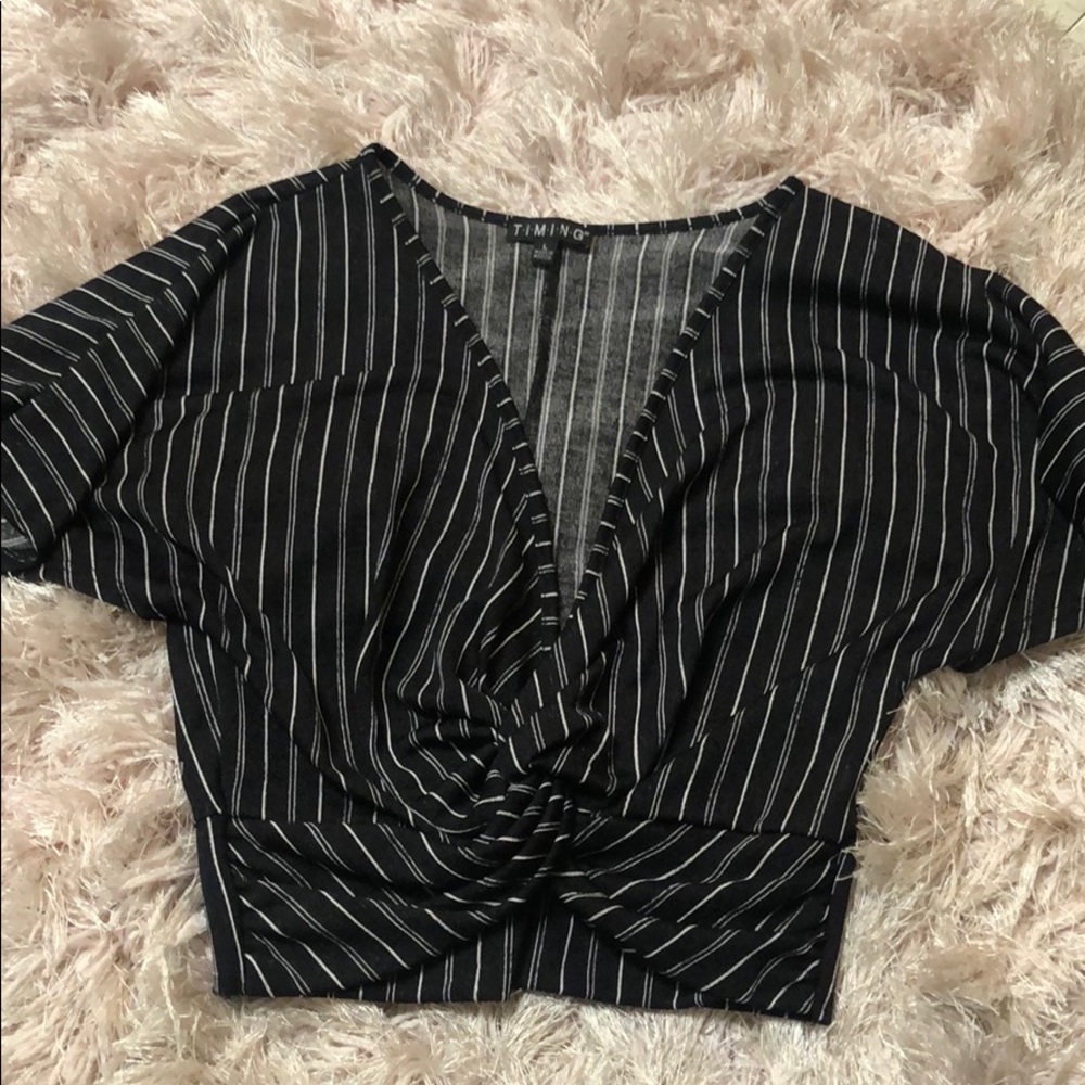 Stripped low cut mid-length top
